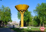 Памятник олимпийскому огню на территории Лужников